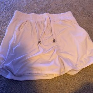 white soft shorts with pockets